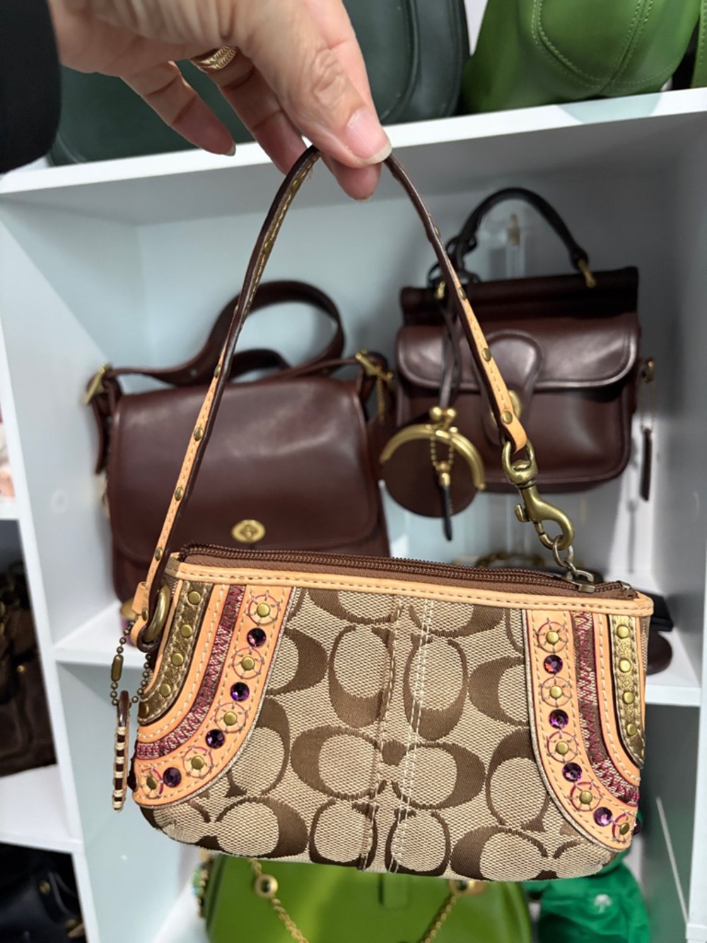 Coach Brown Signature Canvas Wristlet with Pink and Gold Accents